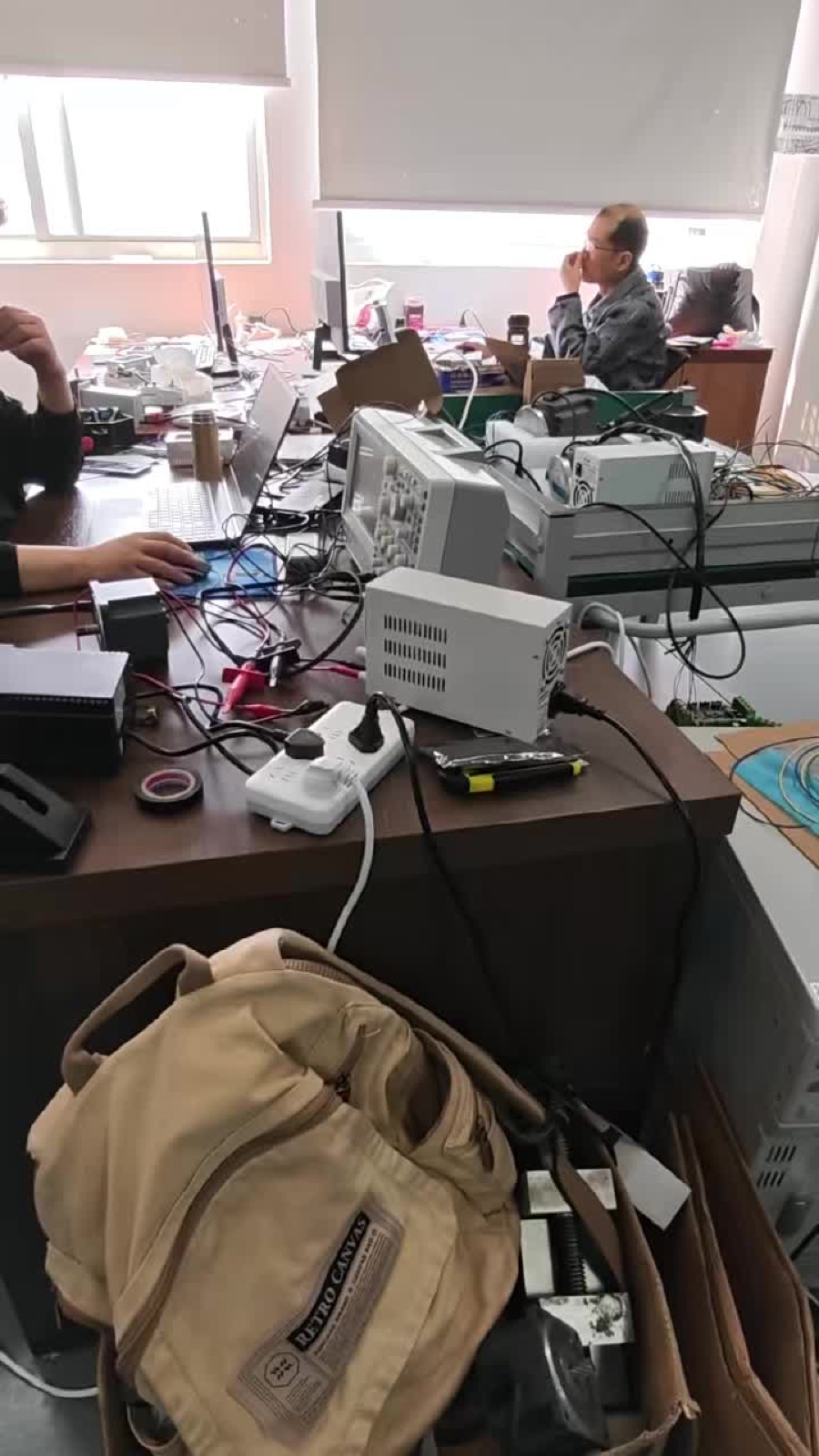 R&D test bench with oscilloscope and power analyzers