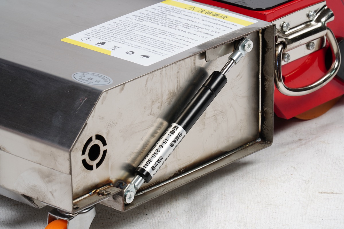 Side gas spring support detail with rating label and side handle