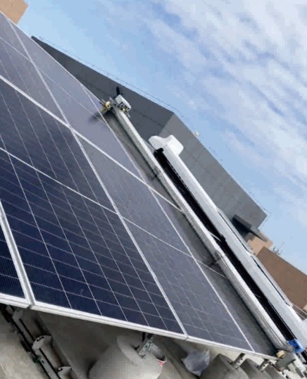 Solar panel cleaning robot powered by BLDC motor on rooftop PV array